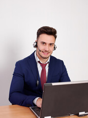 Operator with positive aptitude answering customer calls