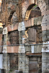 Fototapeta na wymiar Arches of Colosseum in Rome, Italy
