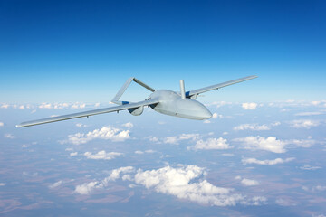 Fototapeta na wymiar Unmanned military drone uav flying reconnaissance in the air high in the sky in the border areas.
