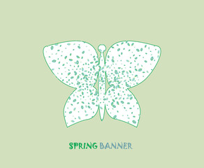Silhouette of a butterfly white on a light background filled with green confetti.