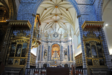 Fototapeta na wymiar Évora, Portugal. Gothic apse of San Francisco church. Inside is the famous Capela dos Ossos (Chapel of Bones). 