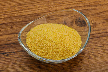Raw cous cous heap in the bowl