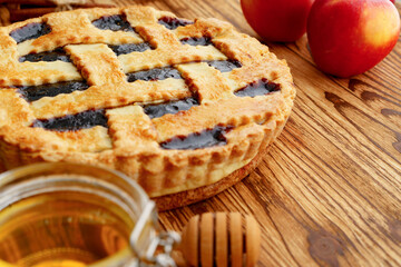 Naklejka na ściany i meble Berry tart pie served on table close up