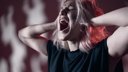 Scared desperate woman screaming and covering ears - Powered by Adobe