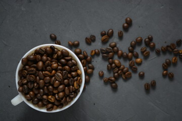 coffee beans in a white Cup