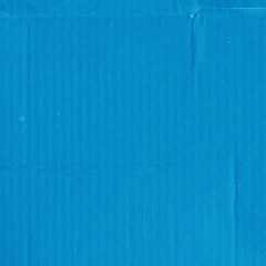 A blue vintage rough sheet of carton. Recycled environmentally friendly cardboard paper texture. Simple minimalist papercraft background.