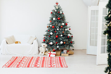 Christmas tree with gifts New Year decoration room