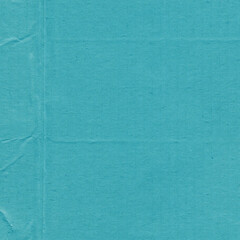 A blue vintage rough sheet of carton. Recycled environmentally friendly cardboard paper texture. Simple minimalist papercraft background.