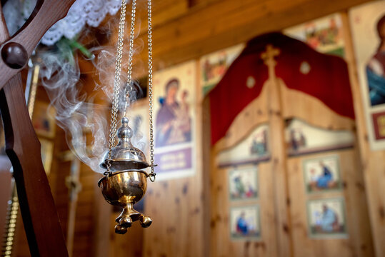 smoking censer against the altar