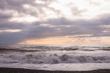 Black sea waves and cloudy sky