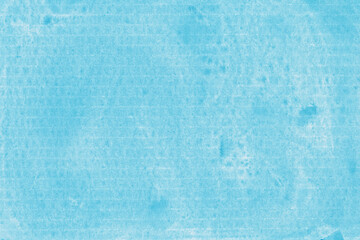 A blue vintage rough sheet of carton. Recycled environmentally friendly cardboard paper texture. Simple minimalist papercraft background.