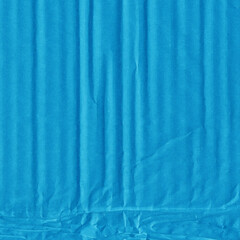 A blue vintage rough sheet of carton. Recycled environmentally friendly cardboard paper texture. Simple minimalist papercraft background.