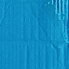 A blue vintage rough sheet of carton. Recycled environmentally friendly cardboard paper texture. Simple minimalist papercraft background.