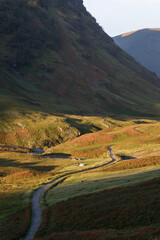 Campers in Glencoe on early autumn morning