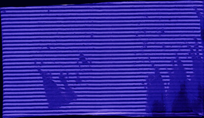 Close up of a violet vintage torn sheet of carton. Cardboard paper texture with a blank background. Empty papercraft surface. Isolated shape and element.