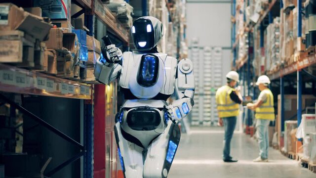Closeup of warehouse robot taking inventory of goods