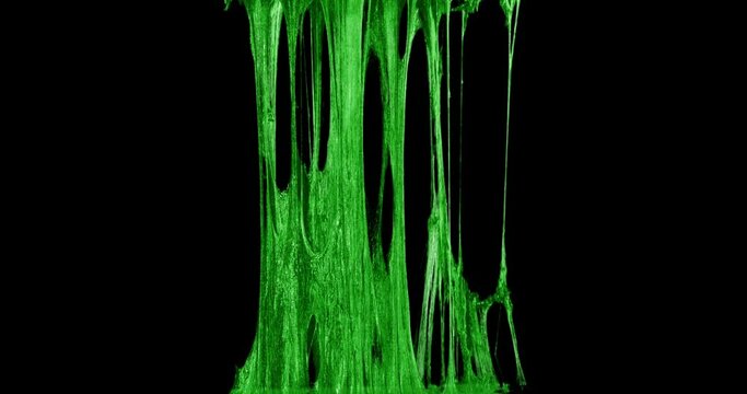 Green Slime Dripping In Black Background 