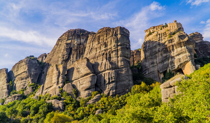 Fototapeta na wymiar Horizontal panoramic view of the Holy Monastery of Varlaam in Meteora, Thessaly, Greece built on top of unique rock formations