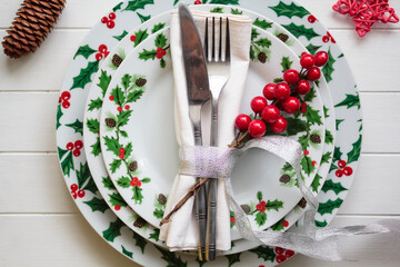 Top view of Christmas Table Setting on white wooden table