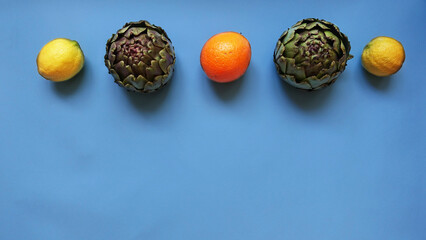 Vegetables and fruits on the blue background