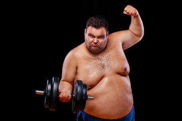 Fototapeta na wymiar Fat man doing workout traning with dumbbells. Happy guy isolated over yellow background.