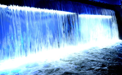 water flowing from the waterfall
