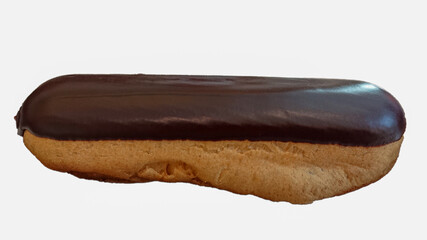Delicious dessert. The eclair is covered with chocolate. Isolated image on a white background.