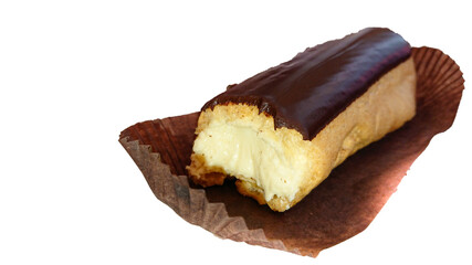 Delicious dessert, isolated image on a white background. The eclair is covered with chocolate that someone has already bitten.