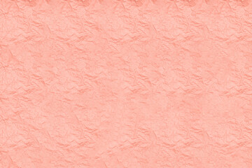 Abstract packaging craft wrinkled paper texture, background  toned in trendy color 2020 coral pink