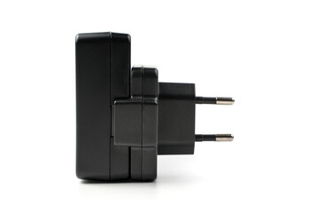 Charger for appliances side view on a white background. Concept of accessories for equipment.