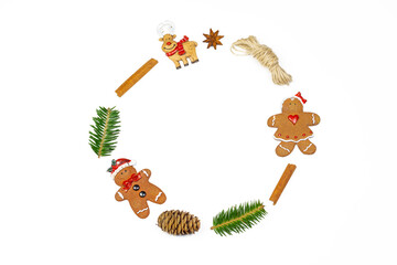 Christmas wreath. Christmas and New Year holidays decorations with fir branches, Christmas tree toys, red berries golden confetti and red stars.