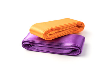 Orange and purple ribbons isolated on a white background. The concept of sewing accessories.
