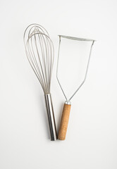 The pestle and whisk isolated on a white background. The view from the top.