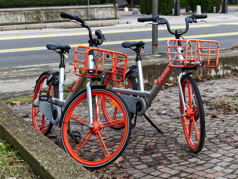 Bologna / Italy - July 8, 2020: Mobike bicycles in bike sharing project for travel inside in the city of Bologna