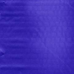 A violet vintage rough sheet of carton. Recycled environmentally friendly cardboard paper texture. Simple minimalist papercraft background.
