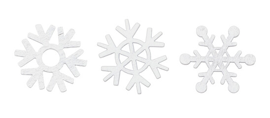 Set of white painted wooden snowflakes for Christmas decoration isolated on white