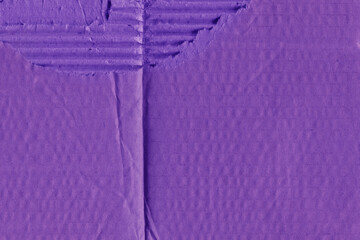 A violet vintage rough sheet of carton. Recycled environmentally friendly cardboard paper texture. Simple minimalist papercraft background.