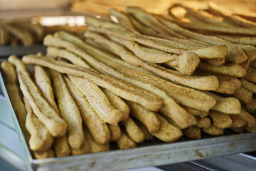 Whole corn bread sticks in the oven