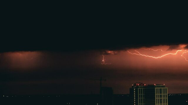 The storm with horizontal lighnings in slow motion