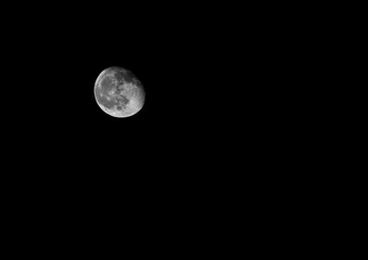 moon in the night sky waning gibbous