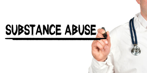 Doctor writes the word - SUBSTANCE ABUSE. Image of a hand holding a marker isolated on a white background.