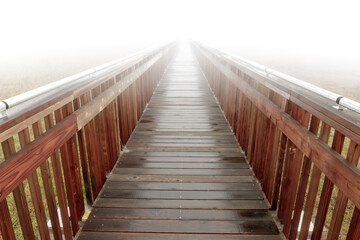 Boardwalk in Thick Morning Fog. Baylands Nature Preserve. Palo Alto, Santa Clara County, California, USA.