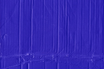 A violet vintage rough sheet of carton. Recycled environmentally friendly cardboard paper texture. Simple minimalist papercraft background.