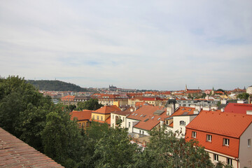 Fototapeta na wymiar Red rooftops of Prague, Czech Republic. Panorama view.