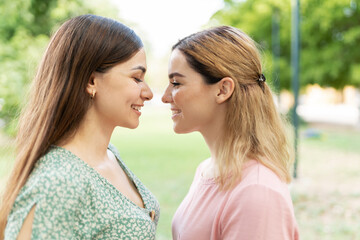 Young gay and happy couple face to face