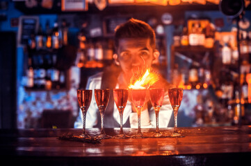Barman creates a cocktail on the pothouse