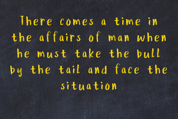 Chalk inscription of smart quote on black desk