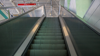 Moving escalator in an airport