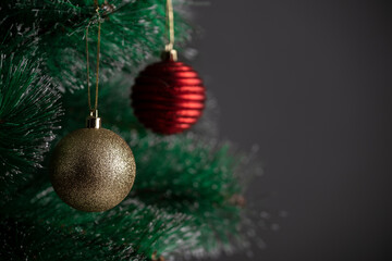 close-up of fir tree decorated with christmas balls