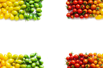 Seamless pattern. The harvest of tomatoes. Different color and varieties of tomatoes on a white...